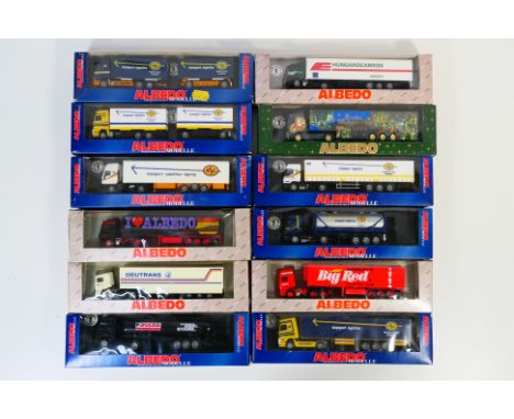Albedo - 12 boxed HO/1:87 scale plastic model trucks from Albedo. Lot includes Albedo Volvo F12 "Wrigley's Big Red"; Renault 