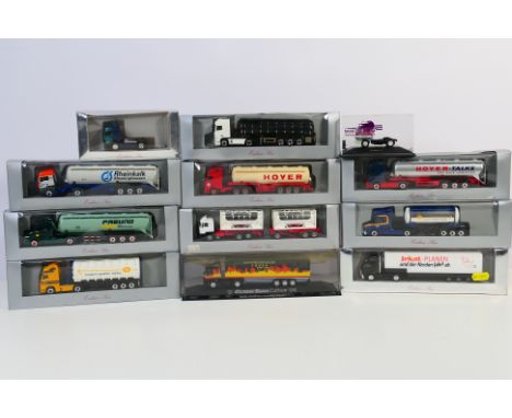 Herpa - A collection of 12 HO/1:87 scale plastic model trucks from various Herpa ranges predominately 'Exclusiv Serie'. Lot i
