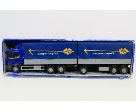 Emek (Finland) - A boxed Emek (Finland) #40700 plastic Scania Truck & Trailer 'ASG'. The 1:25 scale model appears to be in Mi