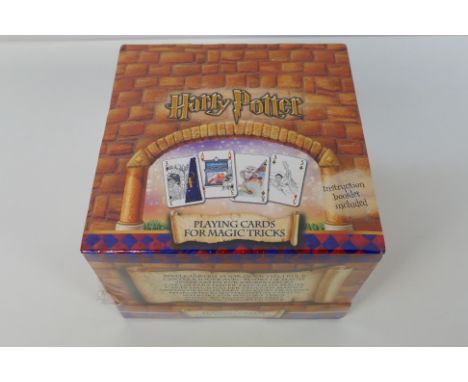 Harry Potter - An unopened shop counter display pack with 6 x packs of Harry Potter playing cards for magic tricks. Still in 