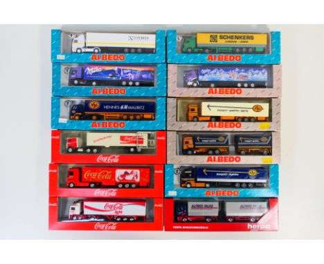 Herpa - Albedo - 12 boxed HO/1:87 scale plastic model trucks. Lot includes Albedo Volvo F12 S3 'Coca Cola Light'; Herpa #1436