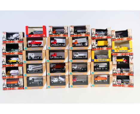 Cararama - A collection of 30 x American trucks in 1:87 scale including Fire trucks, dump trucks, box vans and others. They a