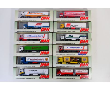 AMW - 12 boxed HO/1:87 scale plastic model trucks from AMW . Lot includes AMW Volvo F16 with refrigerated trailer 'Sties Term