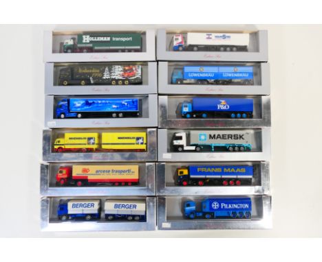 Herpa - A collection of 12 boxed HO/1:87 scale plastic model trucks from Herpa's 'Exclusiv Serie'. Lot includes #17826 Scania