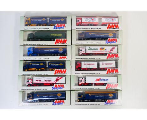 AWM - 12 boxed HO/1:87 scale plastic model trucks from AMW. Lot includes AMW 70842 Volvo FH12 'Paul Pouls'; #53312 'Therkelse