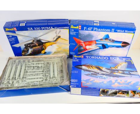 Revell - Three boxed Revell 1:32 scale plastic model aircraft kits. Lot consists of Revell #04718 Tornado ECR 'Tiger Meet 200