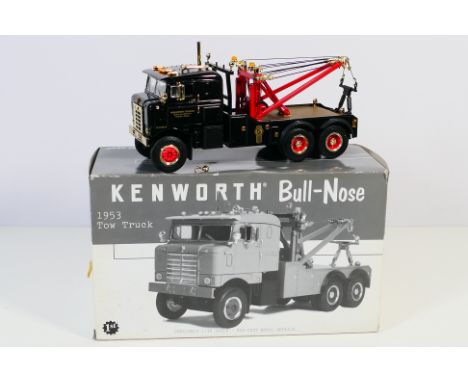 First Gear - A boxed First Gear #19-2565 diecast 1:34 scale 1953 Kenworth Bull-Nose Tow Truck. The model appears to be in Min