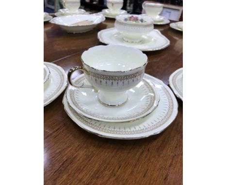 PARAGON 'ATHENE' PATTERN TEA SERVICEcomprising twelve cups, twelve saucers, twelve plates, cake plate and a sugar bowl 