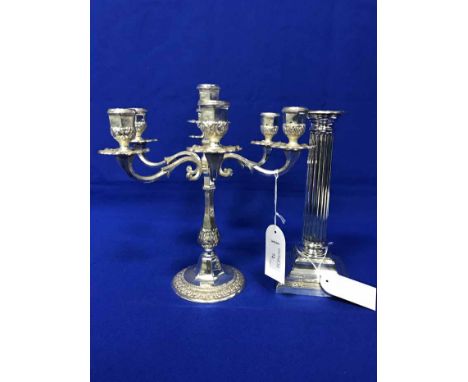 CORINTHIAN COLUMN SILVER PLATED CANDLESTICK, TWO SILVER PLATED SUGAR SIFTERS AND A SIX BRANCH CANDLEBARA ETC
