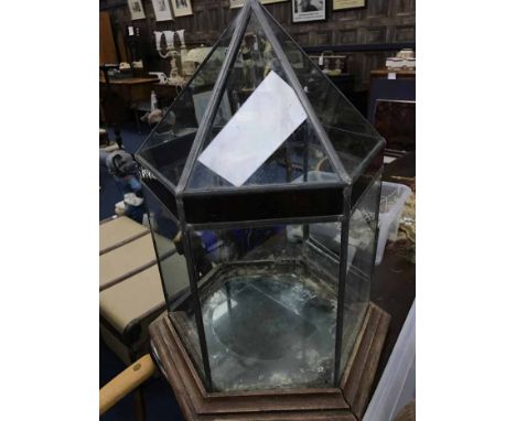EARLY TWENTIETH CENTURY WOODEN SHELVESornately carved, with brass bar details, along with a vintage glass terrarium (2)