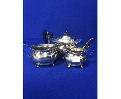 THREE PIECE SILVER PLATED SERVICEtogether with a silver plated basket, flatware, etc 