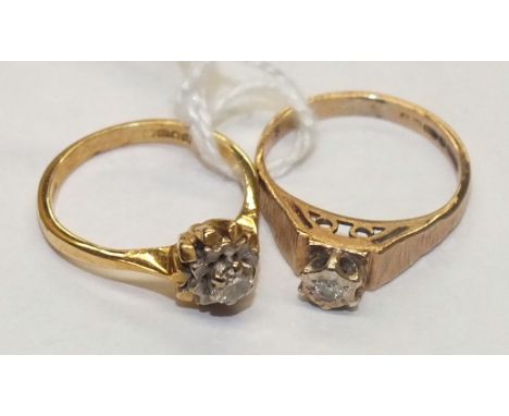 An 18ct gold solitaire diamond ring, size J, 3g and a 9ct gold solitaire diamond ring, size K½, 2.4g, (2).