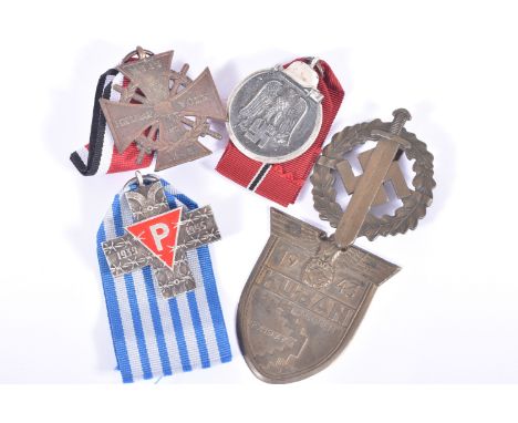 SMALL PARCEL OF GERMAN MEDALS AND AN SA SPORTS BADGE, consisting of a Kuban Shield, a Homeland and nation medal [helmet volk]