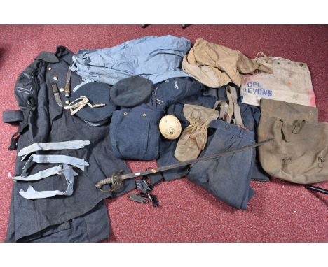 TWO BOXES OF UNIFORMS, KIT BAGS AND A SWORD, to include a RAF Great Coat, two Jackets, one with rank of corporal, a wireless 