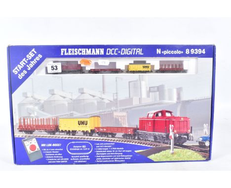 A BOXED FLEISCHMANN N GAUGE STARTER SET, No.89394, DCC ready, appears largely complete with D.B. class V100 locomotive, corre