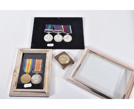 VERY NICE WWI AND LATER FAMILY GROUP OF MEDALS, to include a framed WWI pair of medals awarded to Wesley Tucker who was Priva