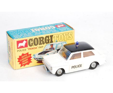 Corgi Toys, 506 Sunbeam Imp Panda car, white body, white bonnet and lower doors, jewelled headlights and blue light, sold in 