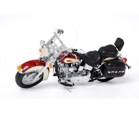 Franklin Mint 1/10th scale model of a Harley Davidson Heritage Softail Classic, finished in cream and maroon with chrome deta