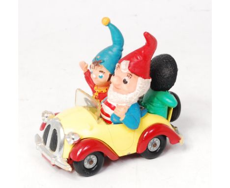 Corgi Toys No.801 Noddy's Car, yellow and red with plated parts, with grey faced golly, loose example (G) 