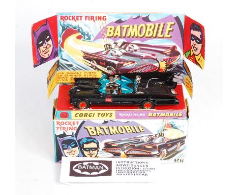 Corgi Toys, 267 Batmobile, gloss black body with red Bat logo on doors, gold cast hubs, with figures, pulsating exhaust, with