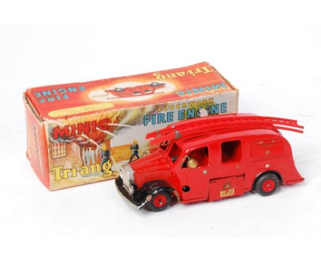 Triang Minic Fire Engine, 1950's example, red body with both red plastic ladders, brass bell, red plastic hubs, headlamps and