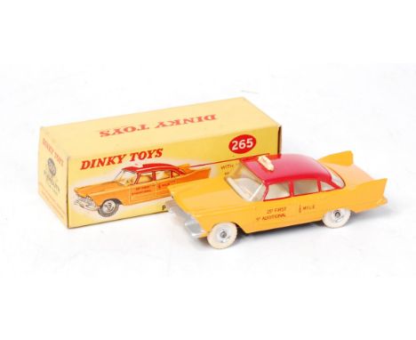 Dinky Toys, 265 Plymouth USA taxi, yellow with red roof and transfers, fair details on the door, white tyres, in the original