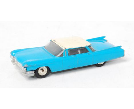 Lone Star Roadmasters 1/50th scale Cadillac 62 Sedan, blue body with white roof, with chromed hubs, play worn (G)