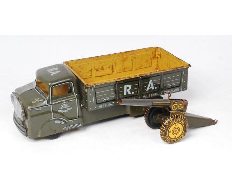 Marx Toys (UK) Army Transport Truck and Cannon, large scale tinplate truck finished in green, missing beige canvas tilt, Roya