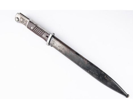 A Third Reich K98 bayonet, by W K C, the blade with later etched panels inscribed "3 Panzer Regt:- "Grossdeutschland" and "De