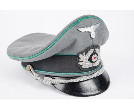 A copy of a Third Reich Army officers peaked cap, light green piping. GC  £50-60 
