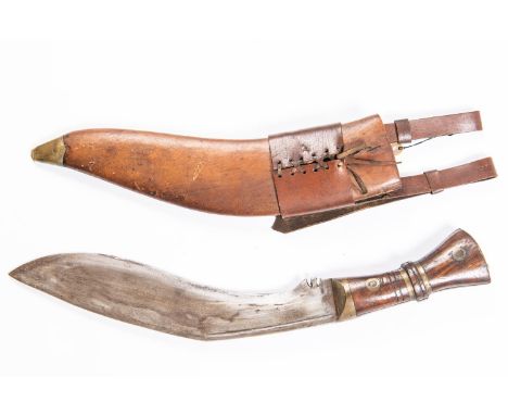 A copy of a WWI military issue kukri, blade 12½" stamped with broad arrow over "I", date 1917, etc, brass mounted hilt with w