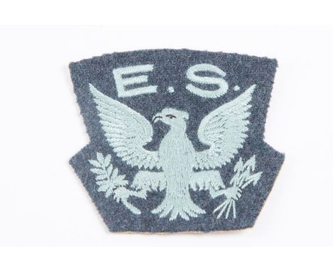 A rare original WWII Eagle Squadron cloth shoulder patch, British made. £200-300 