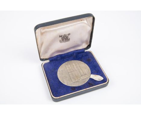 A silver Westminster Abbey 900th Anniversary Commemorative Medal (1065 - 1965). Hallmarked for London 1966, maker's mark JHJ.