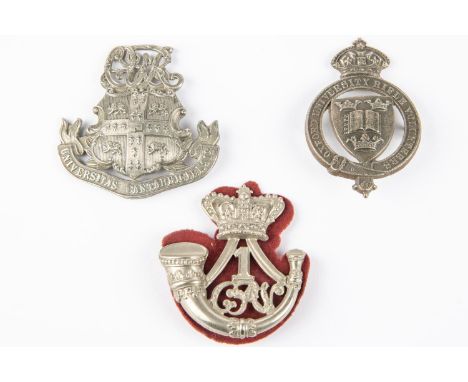 A WM glengarry badge of Oxford University Rifle Volunteers; another, with "1 CRV" within crowned strung bugle; and the device