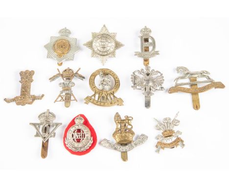 Twelve Cavalry cap badges: KDG (1915-37), chrome plated QDG, 3rd Carabiniers (lugs), 4/7th DG (lugs); pre 1948 Royal Dragoons