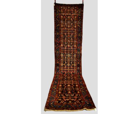 Good Bijar herati design runner, north west Persia, circa 1920s, 13ft. 3in. x 3ft. 8in. 4.04m. x 1.12m. Lacking part of the m