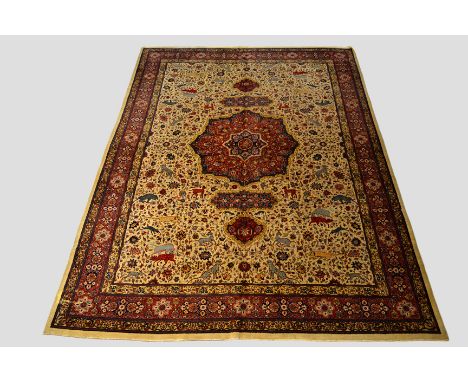 Sivas carpet of classic hunting design on an ivory field, east Anatolia, circa 1930s, 12ft. 3in. x 8ft. 10in. 3.73m. x 2.69m.