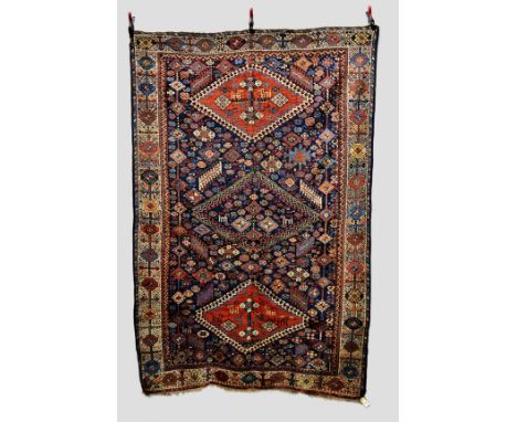 Exceptional Lori rug with dark blue field and Shekarlu border, Boyr Ahmad va Kohgiluyeh, south west Persia, late 19th century