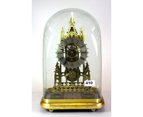 An 19th century brass skeleton clock by R. Donaldson, 8, Hinde Street, London W1 with five spoke wheelwork under glass dome. 