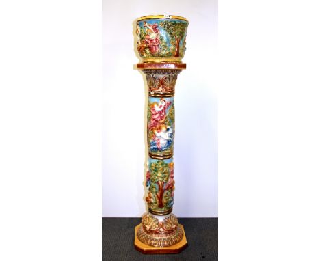 An ornate Italian ceramic jardinere on stand, H. 130cm.