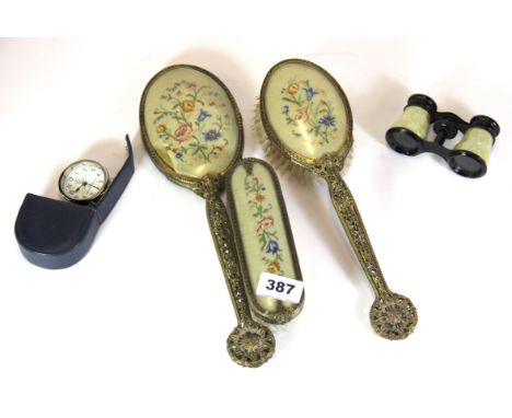 A vintage dressing table set, opera glasses and Orient Express travel clock.