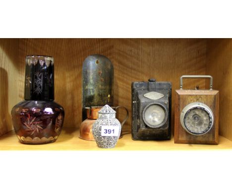 Two early torches, copper candle holder, ruby glass night decanter and a vintage pomander.