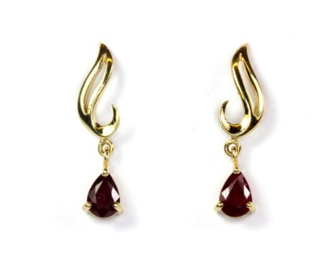 A pretty pair of 14ct yellow gold ruby set earrings, L. 2.5cm.