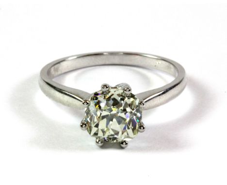 A white metal (tested 18ct gold) solitaire ring set with an old cut diamond (approx. 2.40ct) (R).