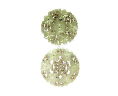 A pair of 19th century nephrite jade hair ornaments. D. 5.2 cms.