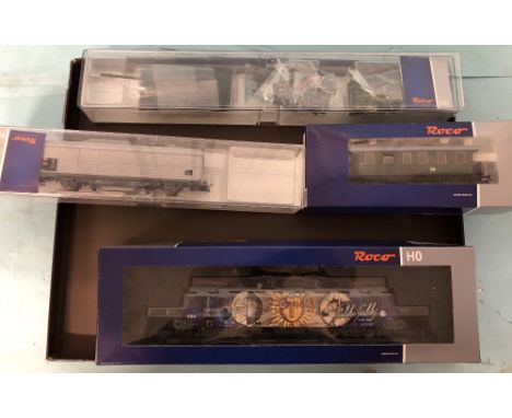 Roco HO scale diesel locomotive with DCC digital sound and assorted boxed rolling stock