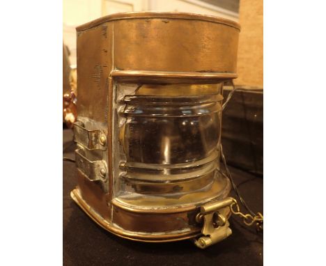 Copper and glass ships binicle light converted to electricity
