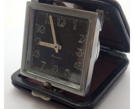 Eight day Swiss made travel clock CONDITION REPORT: This item is working at lotting.