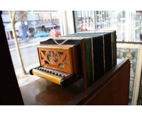 A 1960s East European accordion, with button operated bells.