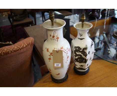 A baluster shaped table lamp, decorated with butterflies and flowering branches, together with another similar. (2)